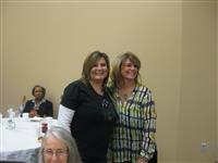 Carmen Harrison, J. L. Everhart Elementary School teacher, received $1,627.50 from Kim Holcomb, Foundation president, for her grant titled "I Love Big Books and I Cannot Lie!" for reading and science education in second grade.